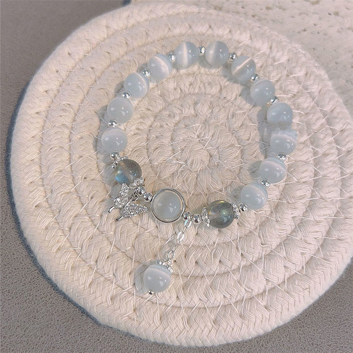 Bracelet de soutien à breloques en forme d'étoile, de papillon et de pierre de lune avec œil de chat et Buddha Stones