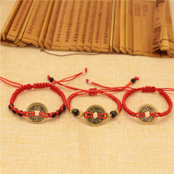 Bracelet tissé en fil rouge avec pièces de cuivre et Buddha Stones