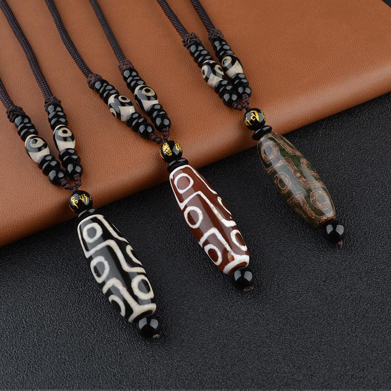 Collier de protection de richesse en perles Dzi à neuf yeux de Buddha Stones - image 0