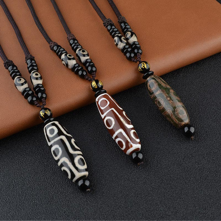 Collier de protection de richesse en perles Dzi à neuf yeux de Buddha Stones