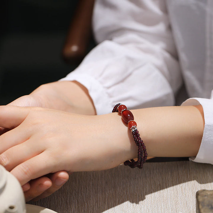 Bracelet triple couche de protection en grenat naturel et agate rouge de Buddha Stones