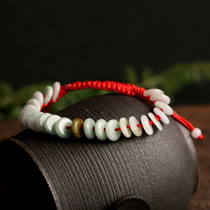 Bracelet de protection en fil rouge Buddha Stones en jade rond naturel