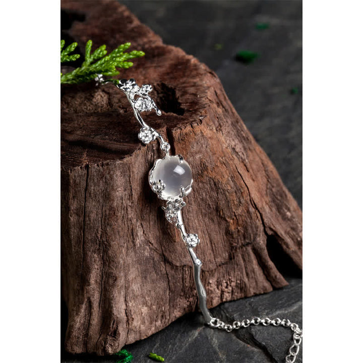 Bracelet positif en calcédoine et fleur de prunier avec Buddha Stones