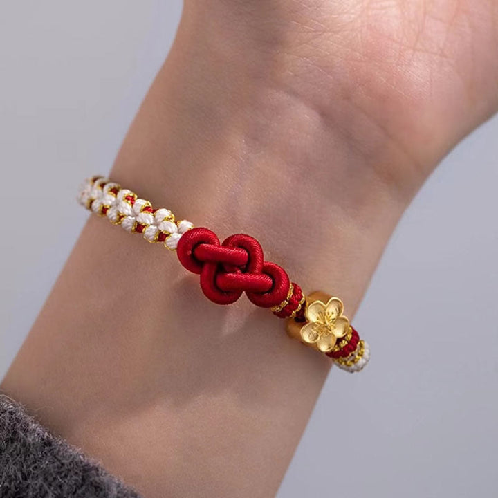 Bracelet porte-bonheur en corde avec breloque en fleur de pêcher et nœud d'amour véritable fait à la main par Buddha Stones