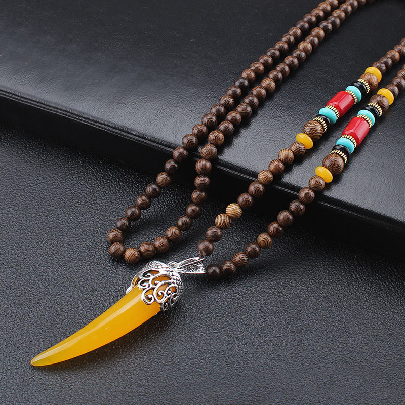 Collier pendentif de méditation en bois de wengé et pierre turquoise de style corne