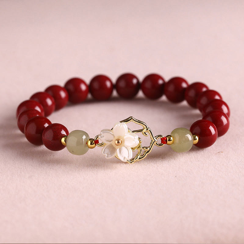 Bracelet de bénédiction en pierre de cinabre naturelle et jade Tridacna avec Buddha Stones