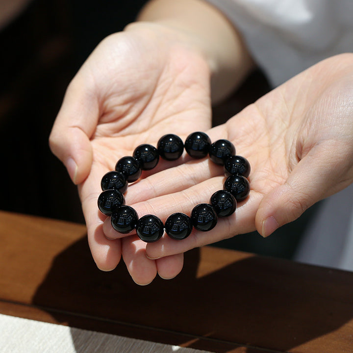 Bracelet porte-bonheur en onyx noir naturel Buddha Stones