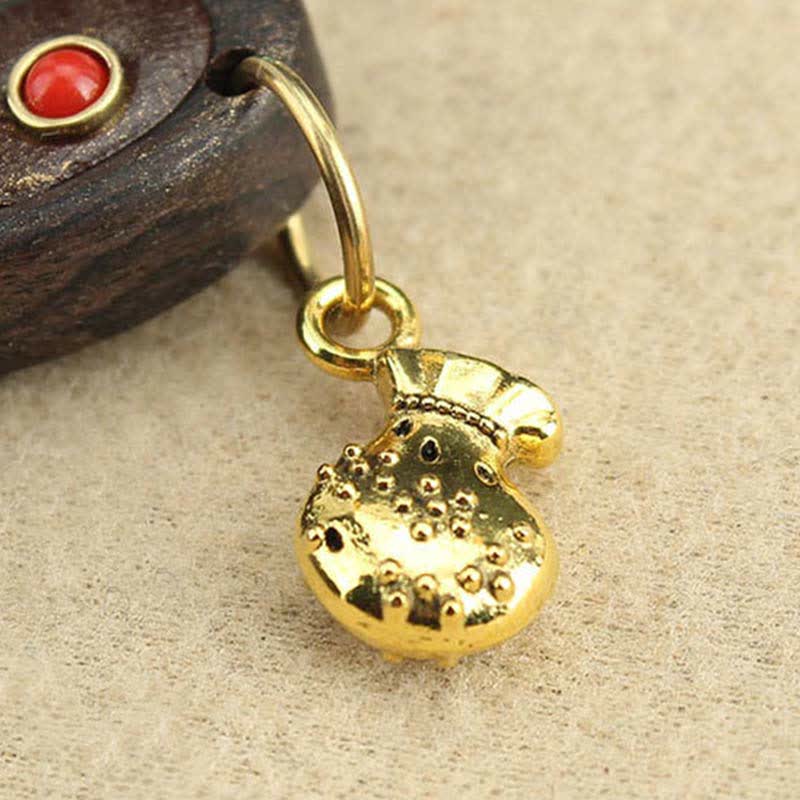 Collier pendentif Thangka en ébène du Tibet représentant les cinq dieux de la richesse