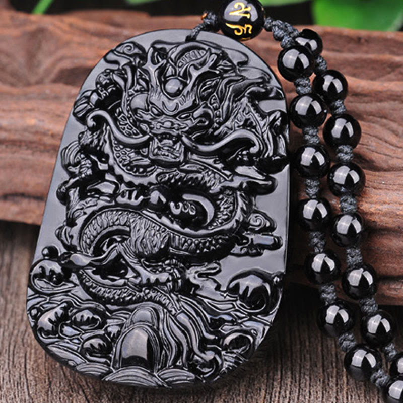 Collier avec pendentif en obsidienne noire représentant un dragon accompli et des Buddha Stones - image 9