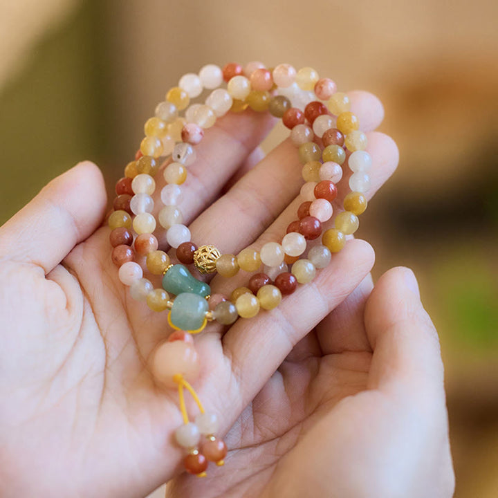 Bracelet triple tour en jade doré et soie naturelle avec breloque citrouille et Buddha Stones