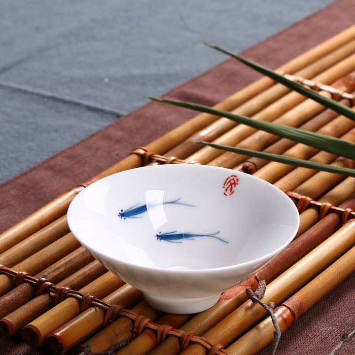 Tasse à thé en céramique de poisson koï en porcelaine bleue et blanche de Jingdezhen Buddha Stones