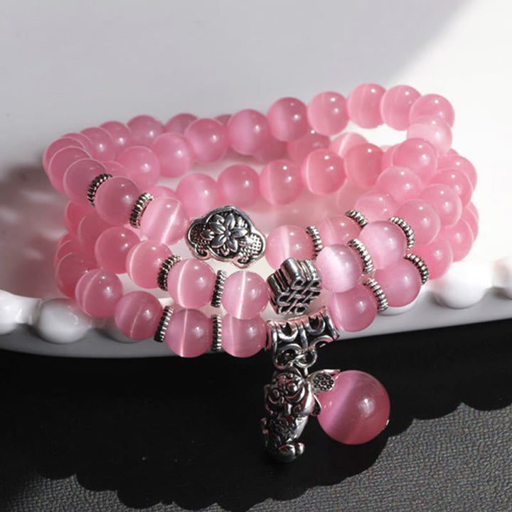 Bracelet triple tour de soutien PiXiu œil de chat en Buddha Stones