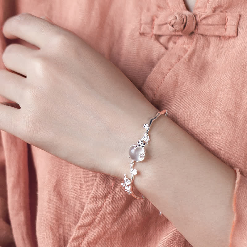 Bracelet positif en calcédoine et fleur de prunier avec Buddha Stones