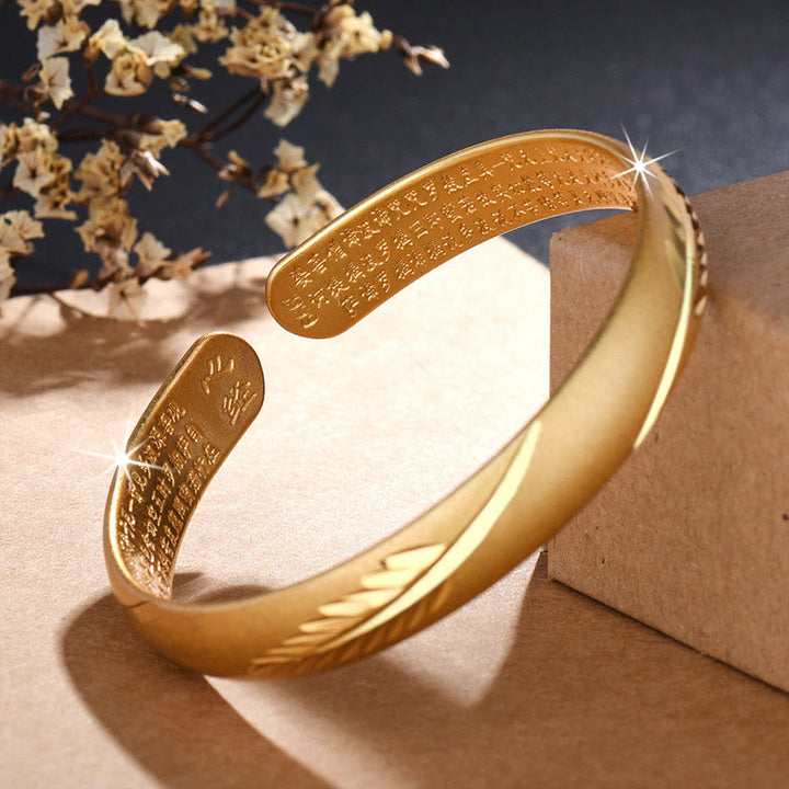 Bracelet manchette en cuivre avec Buddha Stones et plumes et cœur gravé