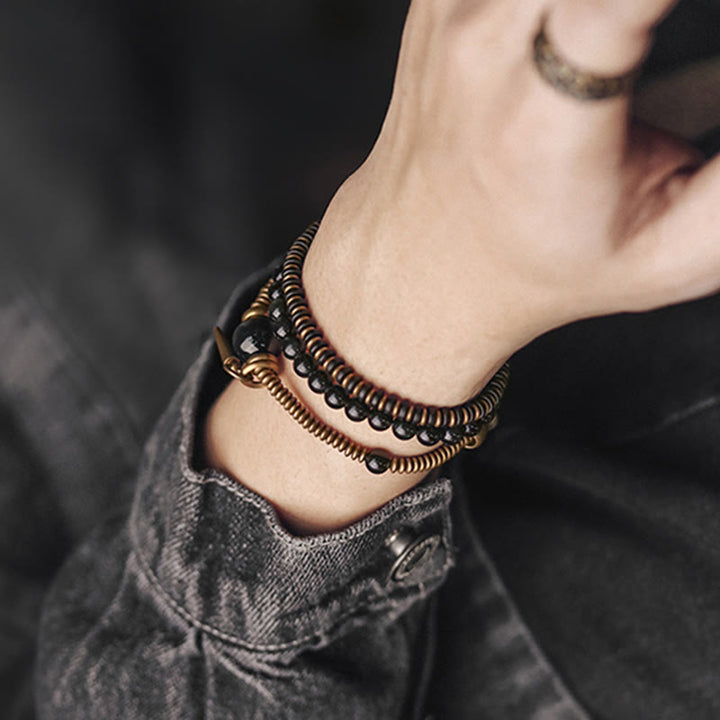 Bracelet triple tour de guérison en cuivre et bois d'ébène avec Buddha Stones arc-en-ciel et obsidienne