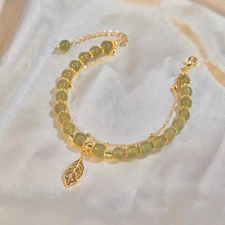Bracelet de perles porte-bonheur en Buddha Stones, feuille de jade, ginkgo, tulipe, arachide, personnage Fu