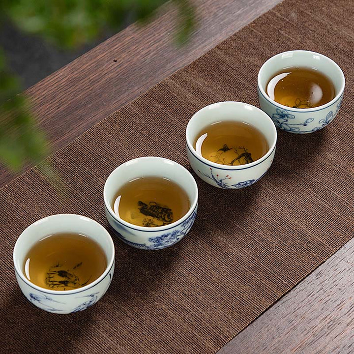 Buddha Stones Paysage bleu Montagnes Lotus Chat mignon Pavillons Magnolia Roseaux Aigrettes Tasse à thé en céramique Petite tasse à thé Kung Fu