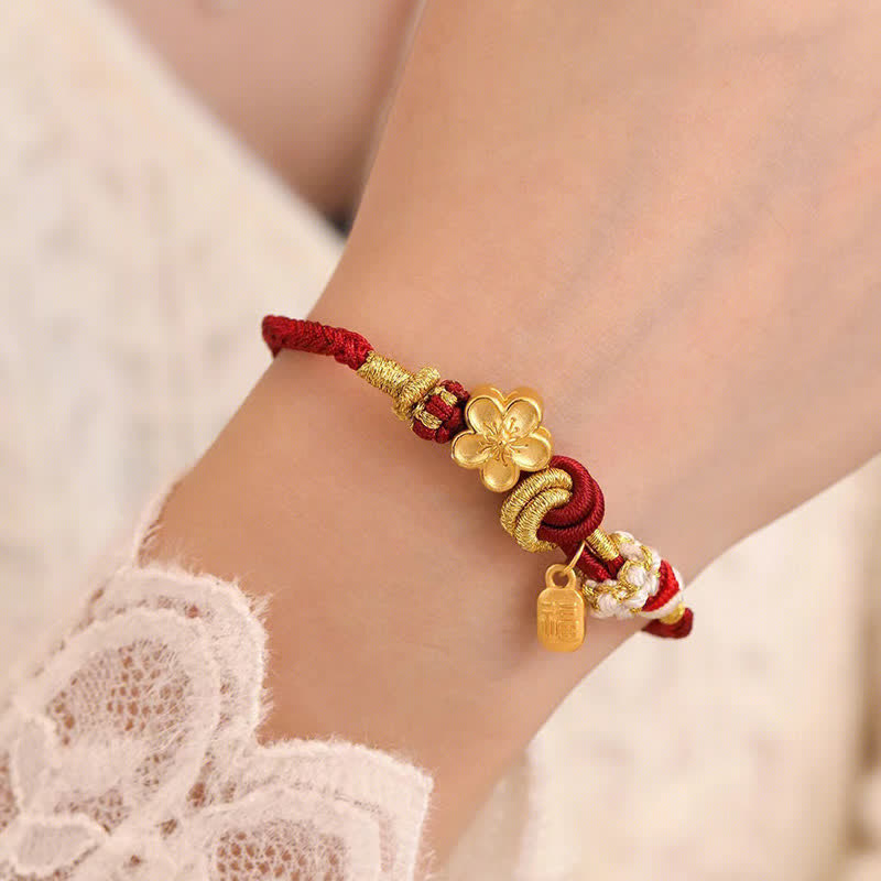 Bracelet porte-bonheur en fil rouge avec Buddha Stones et fleur de pêcher