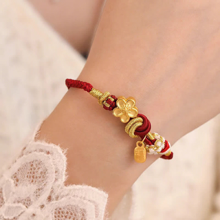 Bracelet porte-bonheur en fil rouge avec Buddha Stones et fleur de pêcher