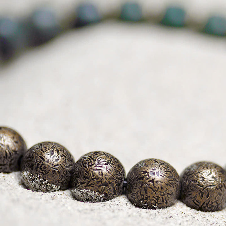 Bracelet tibétain en cuivre avec graines de Bodhi cyan