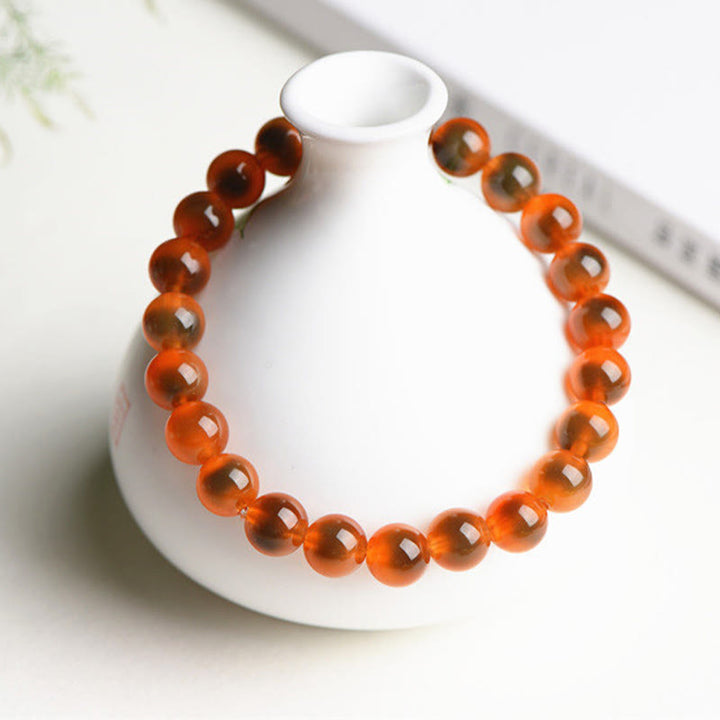 Bracelet de perles en agate naturelle colorée de Buddha Stones Harmony Strength