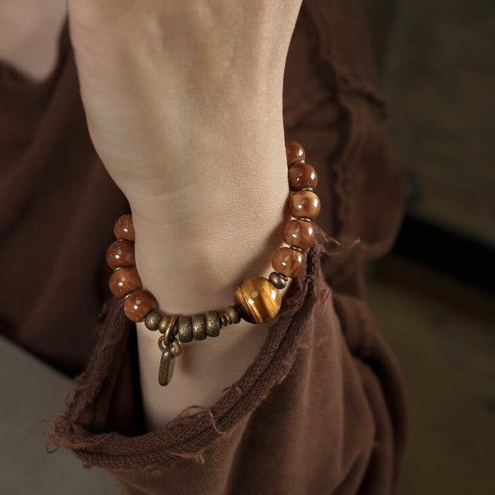 Bracelet porte-bonheur en cuivre et obsidienne dorée avec Buddha Stones de Kuka et œil de tigre