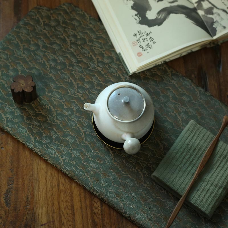 Dessous de verre élégant à motif de brocart floral pour tasse à thé