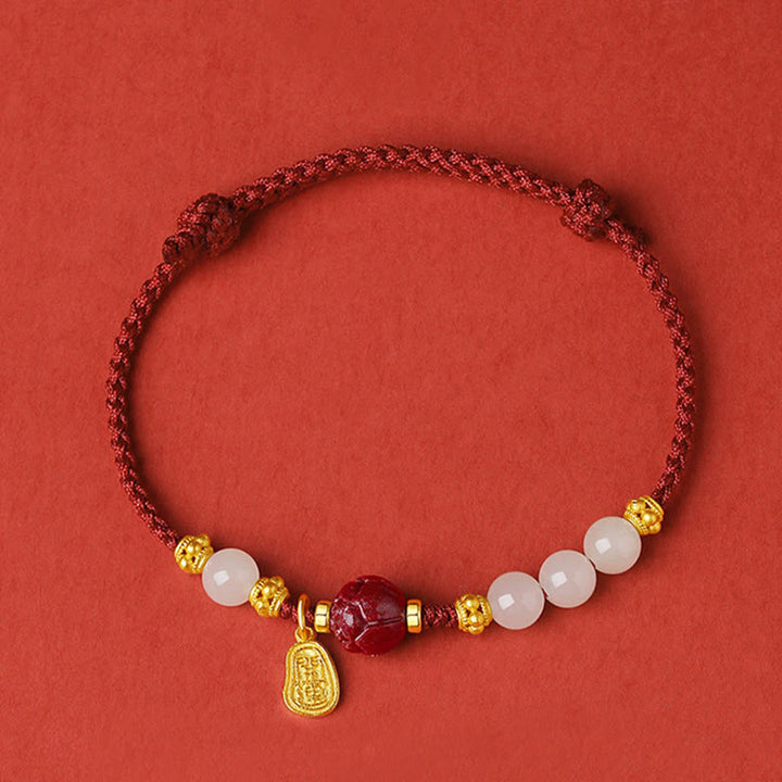 Bracelet en corde porte-bonheur en jade blanc Hetian plaqué or 24 carats avec Buddha Stones et lotus cinabre