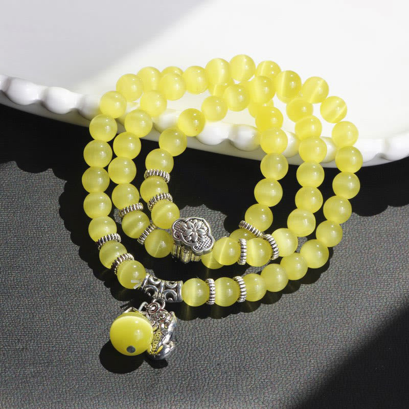 Bracelet triple tour de soutien PiXiu œil de chat en Buddha Stones