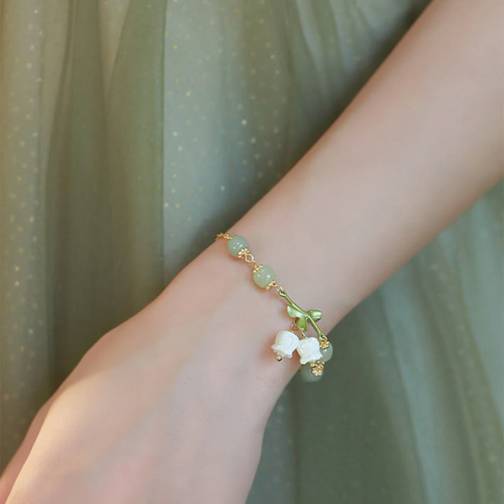 Bracelet chaîne de prospérité en perles de jade vert et muguet de Buddha Stones