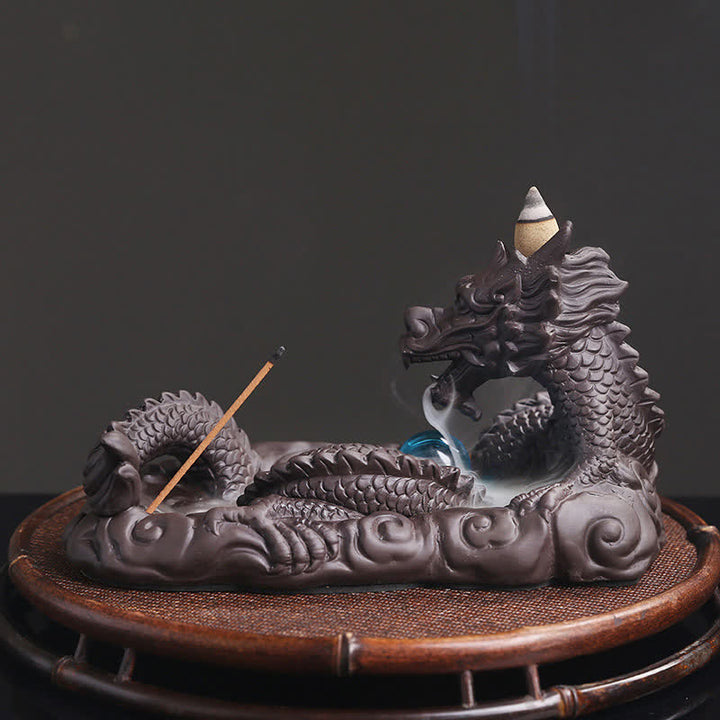 Brûleur d'encens de protection de fleur de dragon jouant à la balle