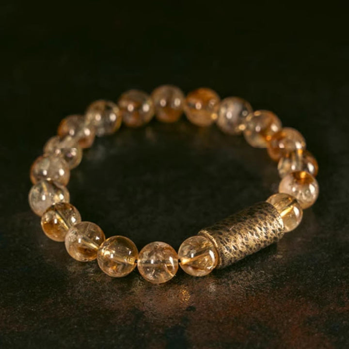 Bracelet de protection en perles de cristal de citrine naturelle et de laiton Buddha Stones