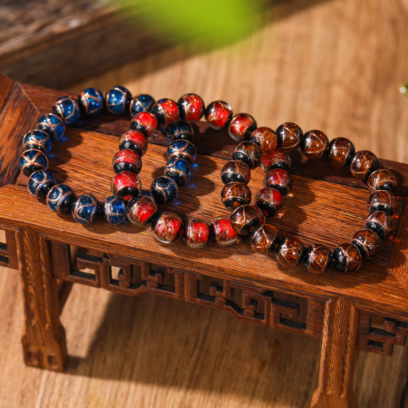 Bracelet tibétain classique en perles de verre Liuli avec Buddha Stones