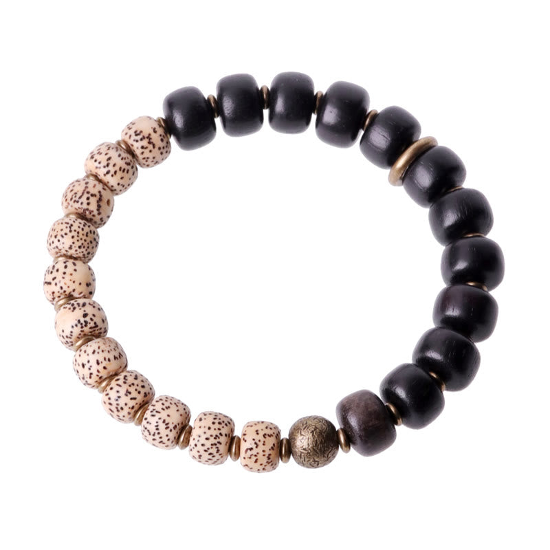Bracelet de paix en cuivre et bois d'ébène avec Buddha Stones et graines de Bodhi tibétaines