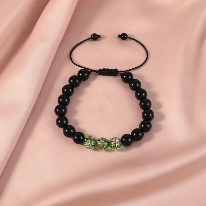 Bracelet de force lumineux en obsidienne noire Buddha Stones
