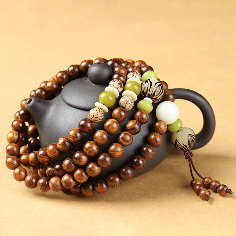 Bracelet Mala tibétain en bois de rose et Buddha Stones pour la protection et le calme