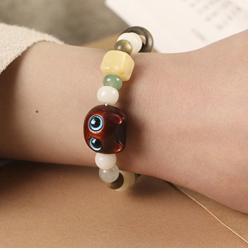 Buddha Stones Graine de Bodhi Bois de santal vert Bois d'ébène Petite feuille Bois de santal rouge Tête de chat Patte Griffe Bracelet de paix - image 13
