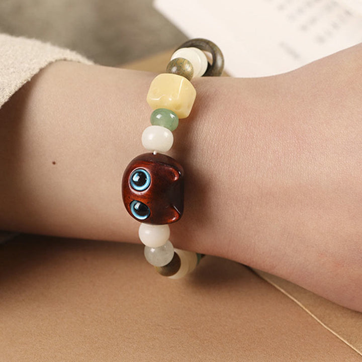 Buddha Stones Graine de Bodhi Bois de santal vert Bois d'ébène Petite feuille Bois de santal rouge Tête de chat Patte Griffe Bracelet de paix - image 13