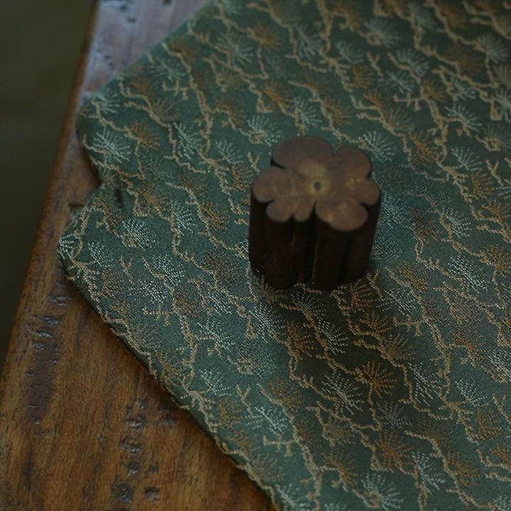 Dessous de verre élégant à motif de brocart floral pour tasse à thé