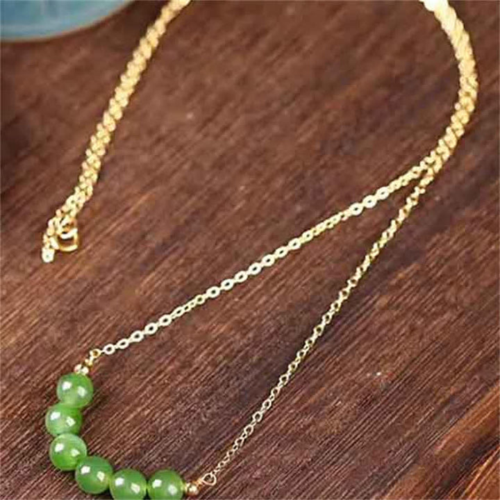 Collier avec pendentif porte-bonheur en perles de jade cyan Hetian plaqué or 14 carats