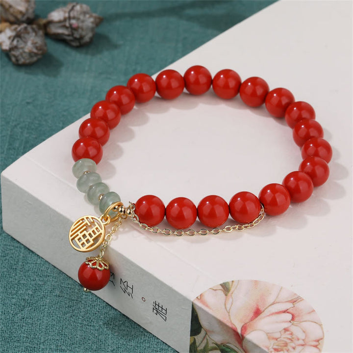 Bracelet de jade apaisant de caractère Fu de bon augure avec Buddha Stones en cinabre
