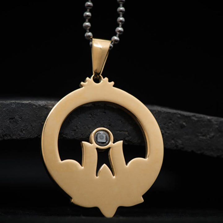 Collier pendentif mantra Shurangama avec projection d'illumination en acier titane et pierres de Buddha Stones Lotus