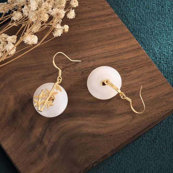 Boucles d'oreilles porte-bonheur en jade blanc Feng Shui Buddha Stones