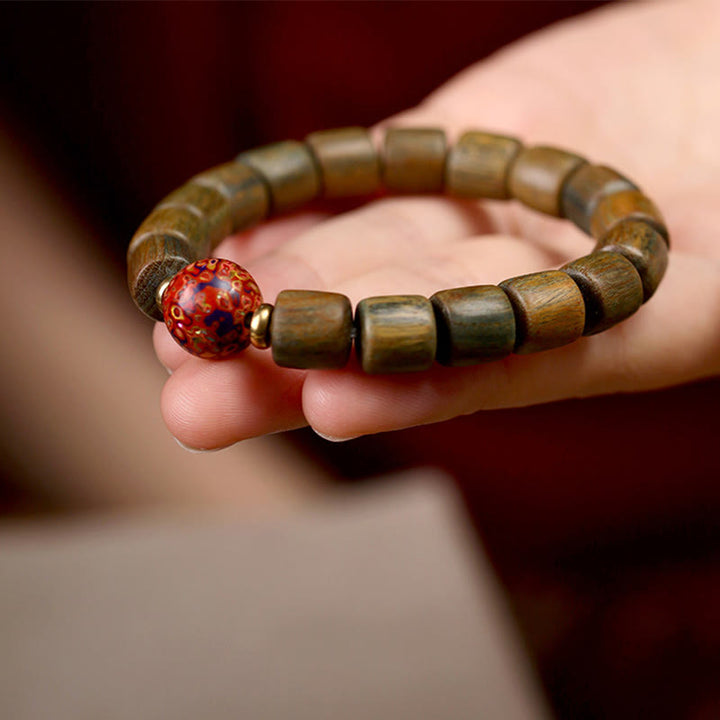 Bracelet de paix en Buddha Stones de bois de santal vert naturel et petites feuilles de bois de santal rouge laqué