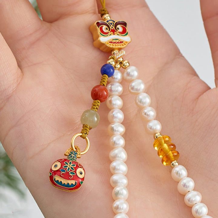 Buddha Stones Perle Naturelle Cinabre Sac d'argent Cloche Or Bête Avalante Lion Dansant Guérison Téléphone Décoration Suspendue