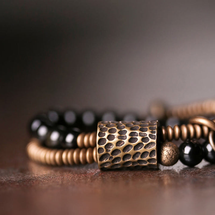 Bracelet double couche de guérison de la paix intérieure en cuivre et obsidienne arc-en-ciel en Buddha Stones
