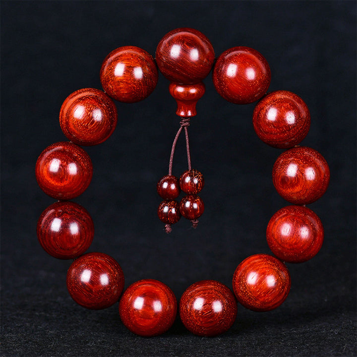 Bracelet d'équilibre tibétain en petites feuilles de santal rouge avec Buddha Stones