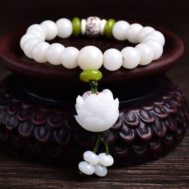 Bracelet porte-bonheur en Buddha Stones et lotus blanc naturel