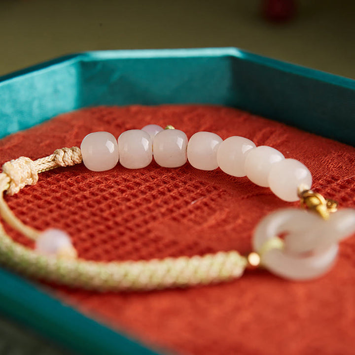 Bracelet tressé en perles de jade Hetian naturelles de Buddha Stones avec boucle de paix double et caractère Fu