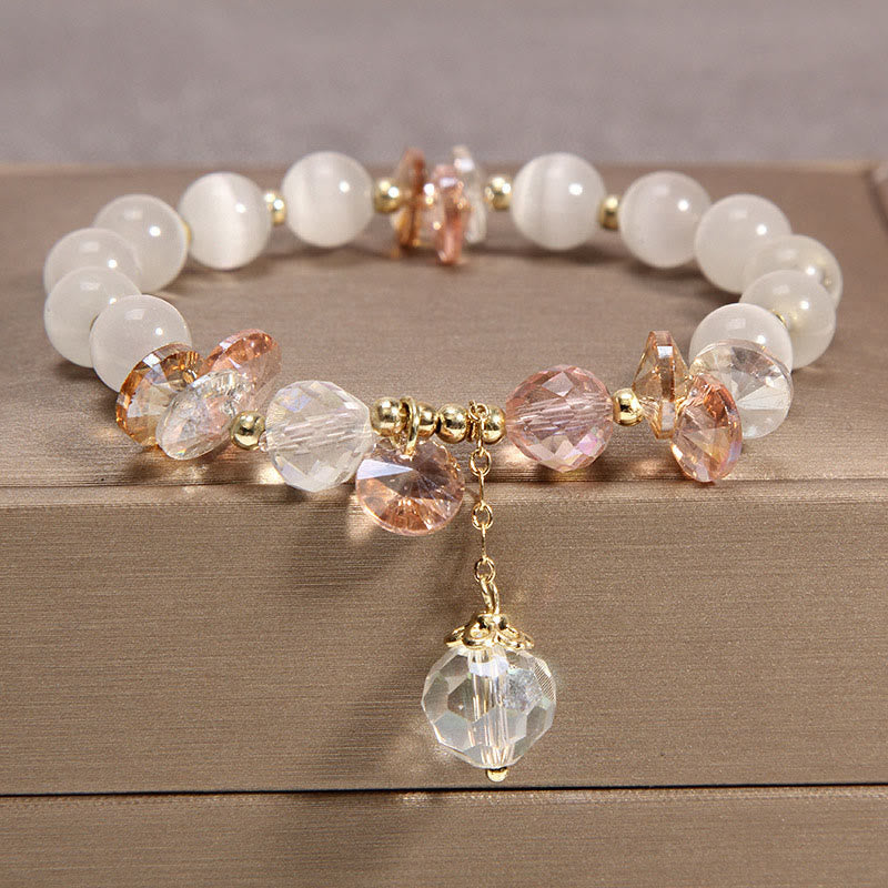 Bracelet à breloques en cristal rose œil de chat Buddha Stones - Œil de chat - image 0